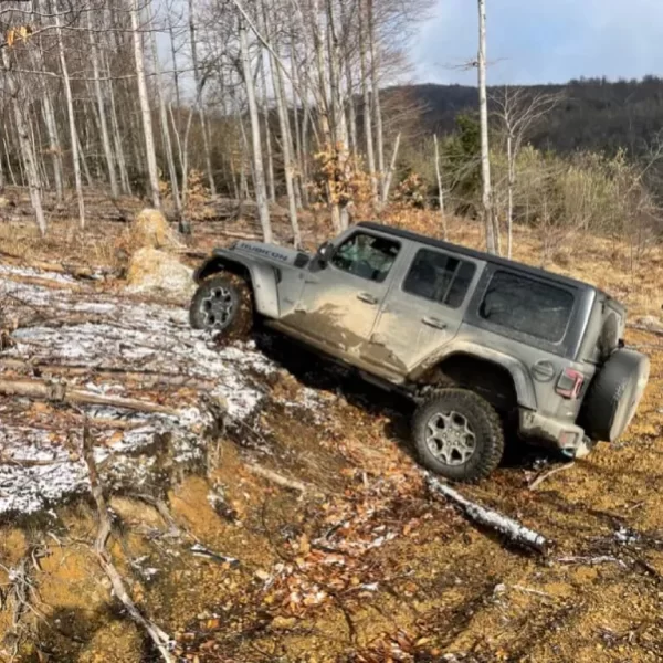 The Jeep climbs up the mountain on untrodden paths.